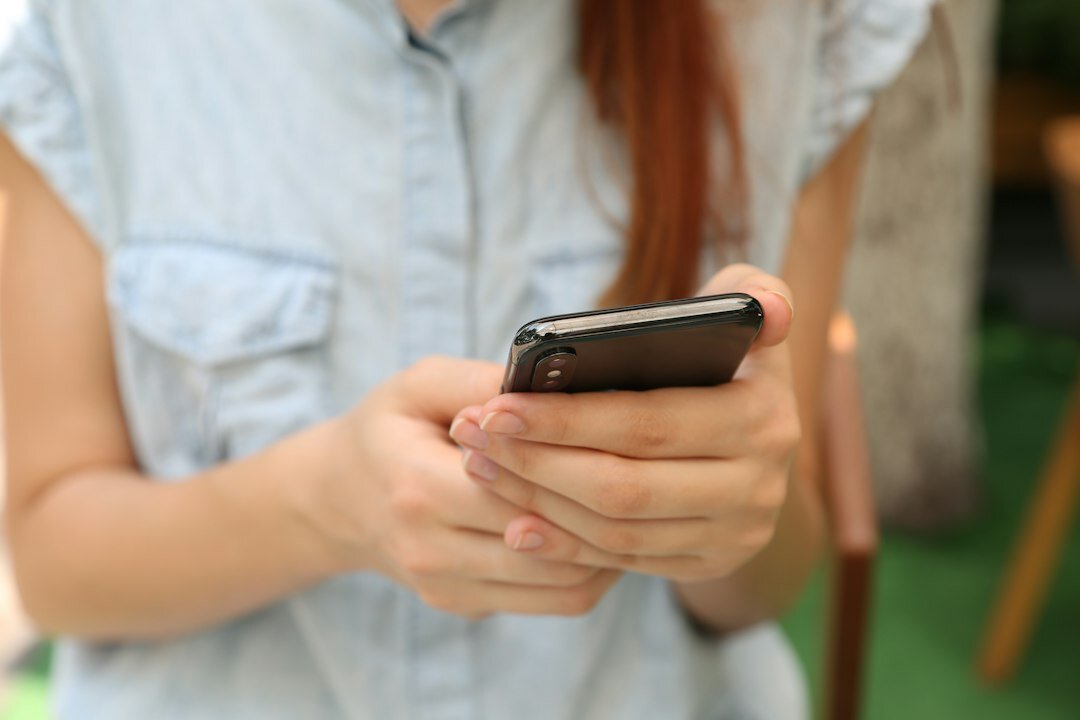 person scrolling phone